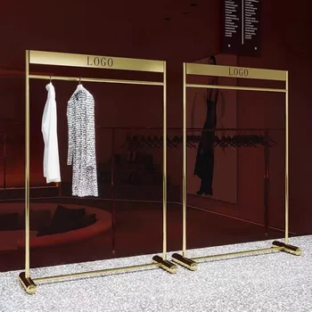 Высококачественный Индивидуальный стеллаж для выставки товаров из нержавеющей стали и золотого металла нового стиля для магазина женской одежды